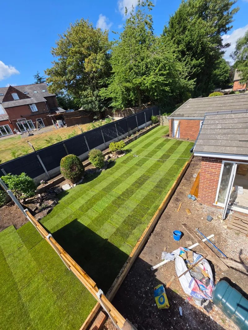 Lush new lawn with sleeper edging and new fencing in Runcorn